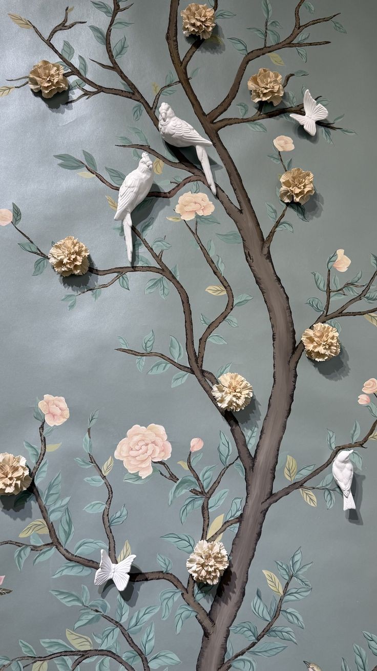3D art elements — sculpted cockatoos and flowers